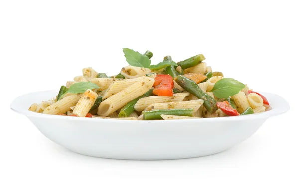 Pasta with pesto sauce and vegetables — Stock Photo, Image