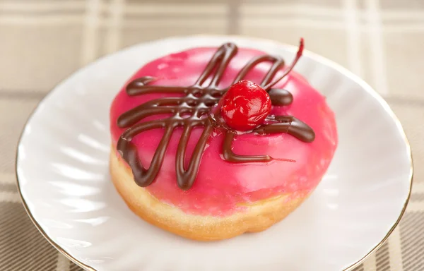 Donut on a plate — Stock Photo, Image
