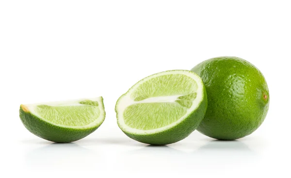 Fresh limes isolated on white — Stock Photo, Image