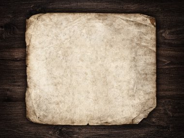 eski kağıt üzerinde koyu renkli ahşap