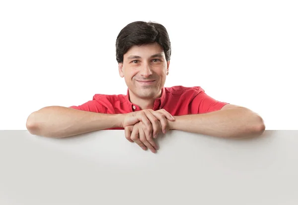 Jovem feliz mostrando e mostrando cartaz pronto para o seu te — Fotografia de Stock