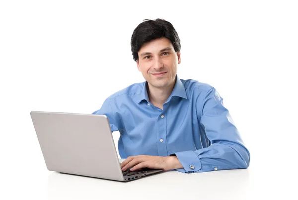 Empresário trabalhando em seu laptop — Fotografia de Stock