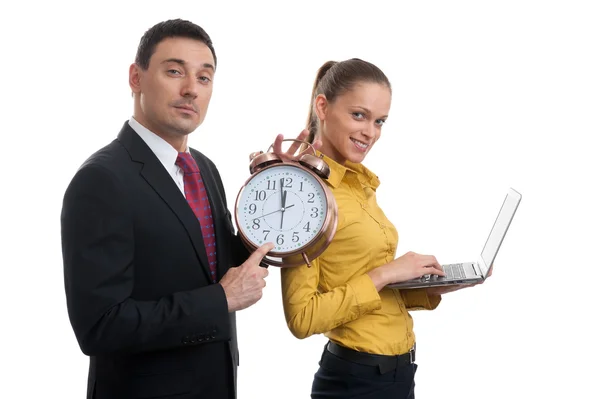 Business people with laptop and alarm clock — Stock Photo, Image