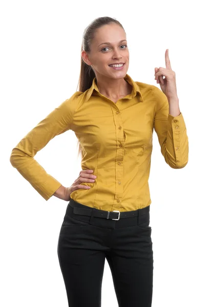 Ung affärskvinna som pekar uppåt — Stockfoto