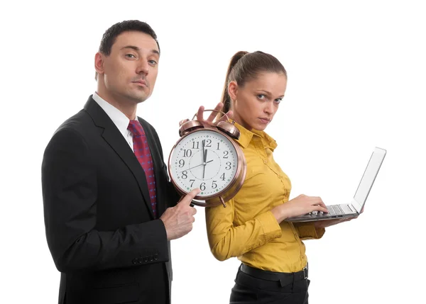 Business people with laptop and alarm clock — Stock Photo, Image