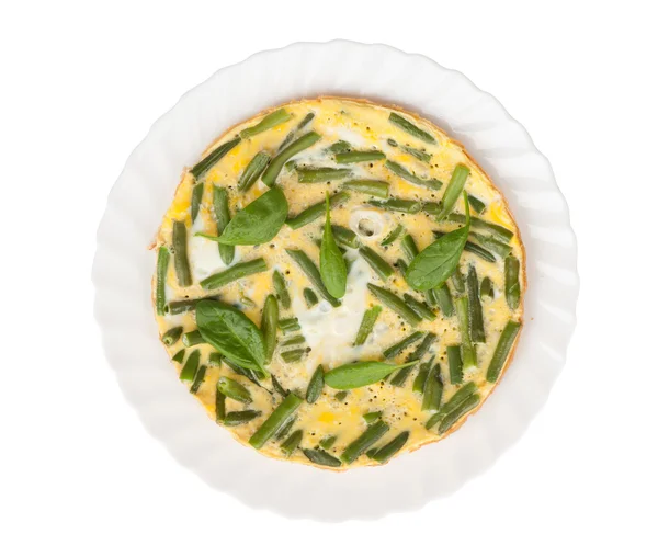 Fried eggs with green beans and spinach — Stock Photo, Image