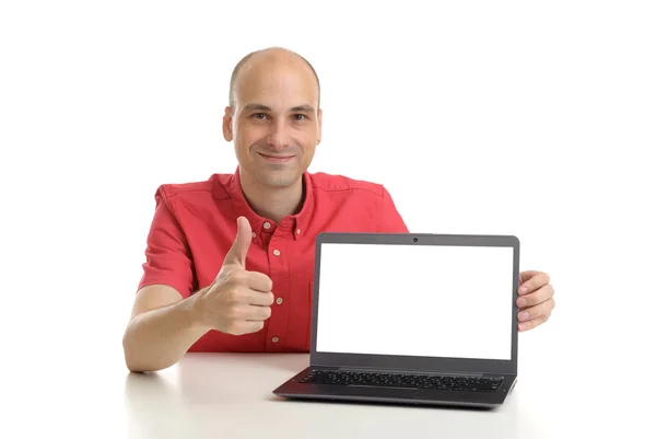 Young man with a laptop — Stock Photo, Image