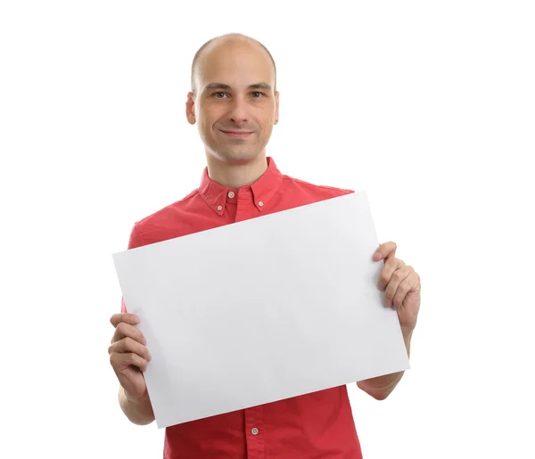 Uomo che tiene carta bianca su sfondo bianco — Foto Stock