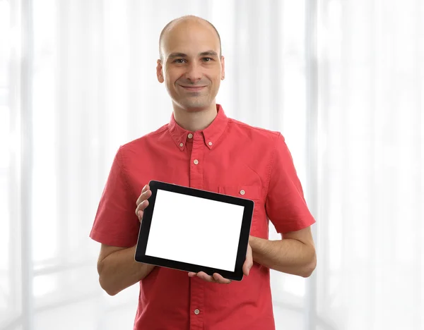 Young man holding a Tablet PC — Stock Photo, Image