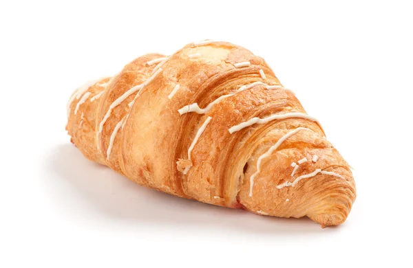 Croissant auf weißem Hintergrund — Stockfoto