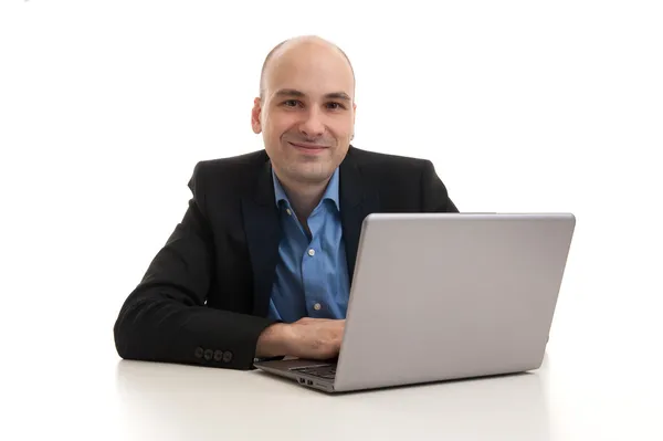 Zakenman met laptop computer — Stockfoto