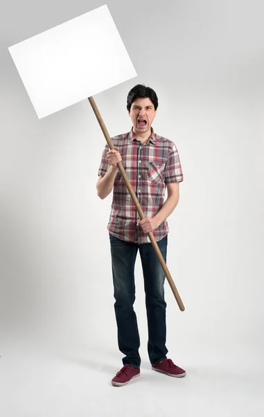 Homem protestante com cartaz — Fotografia de Stock