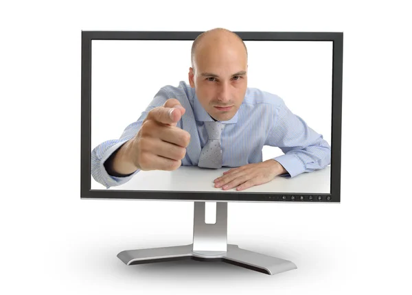 Homem de negócios aponta o dedo para você através do monitor — Fotografia de Stock