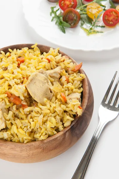 Rice with chicken and vegetable salad — Stock Photo, Image