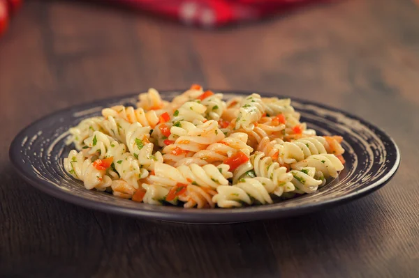 Italian pasta with sauce and vegetables — Stock Photo, Image