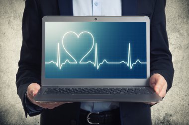 laptop with ekg on the screen  clipart
