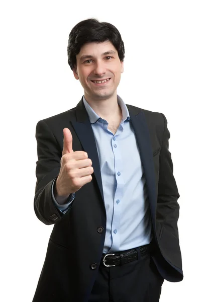 Hombre de negocios sonriente con el pulgar hacia arriba — Foto de Stock