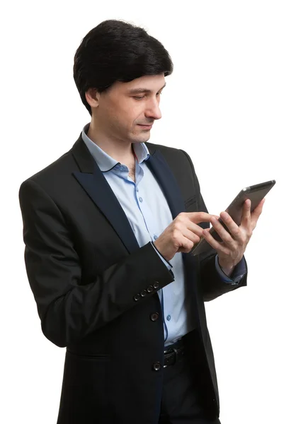 Jovem executivo masculino usando tablet digital — Fotografia de Stock