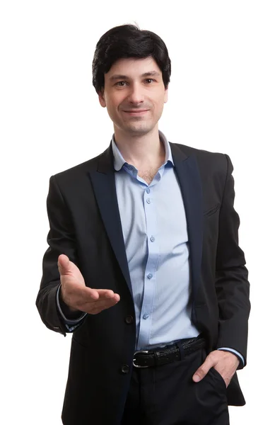 Happy smiling business man giving hand for an handshake — Stock Photo, Image