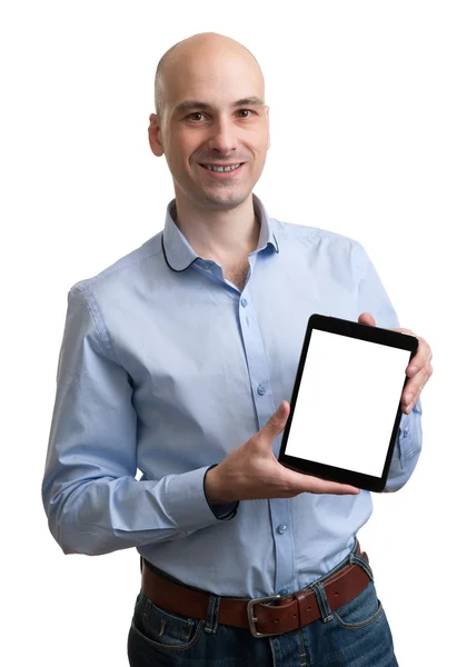 Mladý obchodní muž drží jeho tablet — Stock fotografie