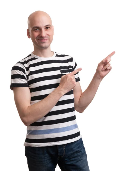 Young man pointing towards something interesting — Stock Photo, Image