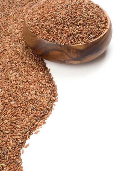 Long-grain red rice on white background — Stock Photo, Image