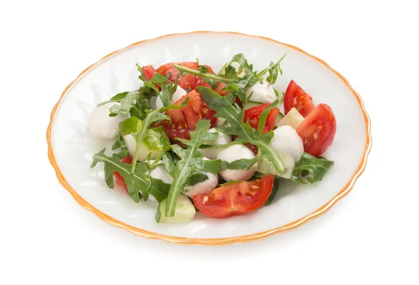 Salade van rucola tomaten en mozzarella — Stockfoto