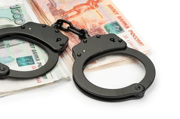 Handcuffs on Russian money — Stock Photo, Image