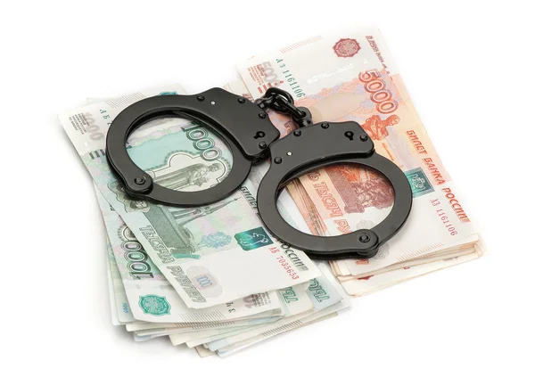 Handcuffs on Russian money — Stock Photo, Image