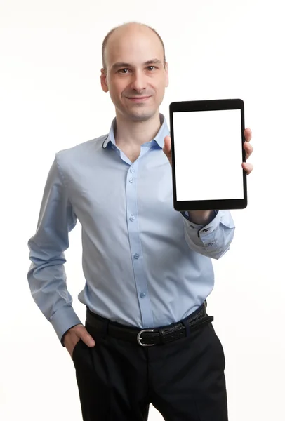 Executivo sorrindo segurando um tablet — Fotografia de Stock