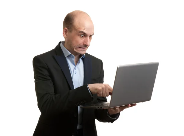 Boze zakenman met laptop computer — Stockfoto