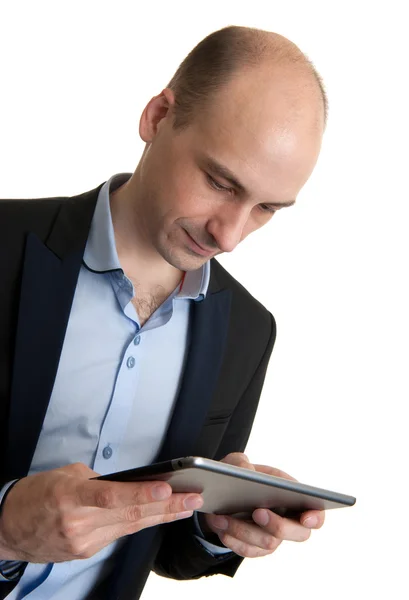 Zakenman met zijn tablet pc — Stockfoto