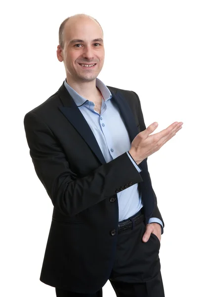 Business man pointing to copy space — Stock Photo, Image