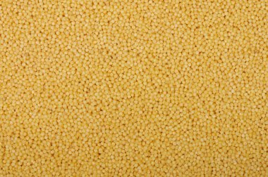 Yellow millet background texture. top view