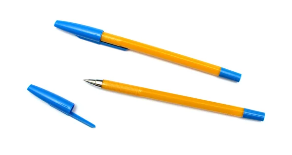 Zwei gelbe Kugelschreiber. isoliert auf weißem Hintergrund — Stockfoto