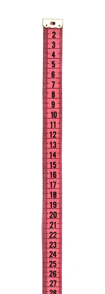 白色の背景に分離されたピンクの測定テープ — ストック写真