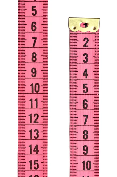 白色の背景に分離されたピンクの測定テープ — ストック写真