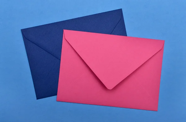 Two envelopes on a blue background — Stock Photo, Image