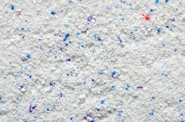 Washing powder texture with blue and red disseminations clipart