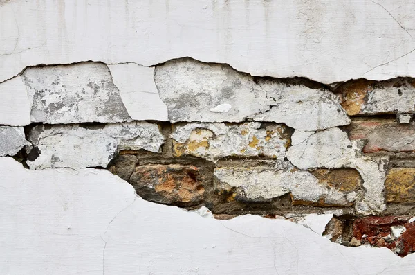 Velho fragmento de parede de tijolo pintado — Fotografia de Stock