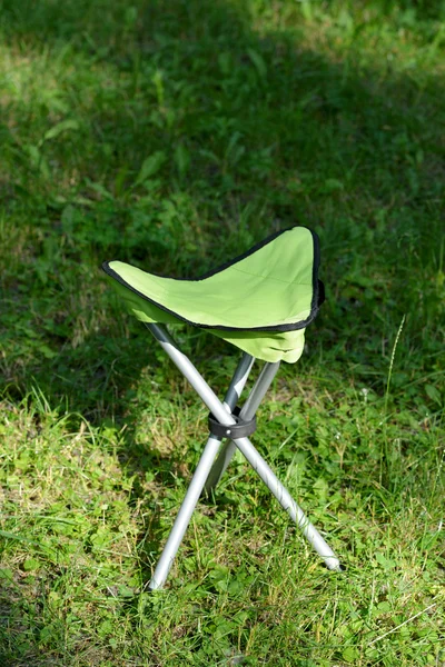 Folds chair in the lawn background — Stock Photo, Image