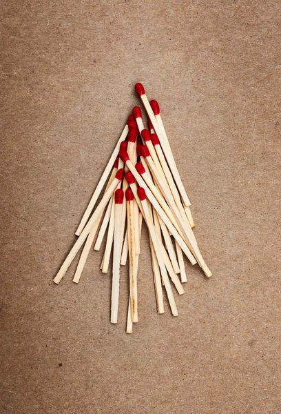 Matches on a brown background — Stock Photo, Image