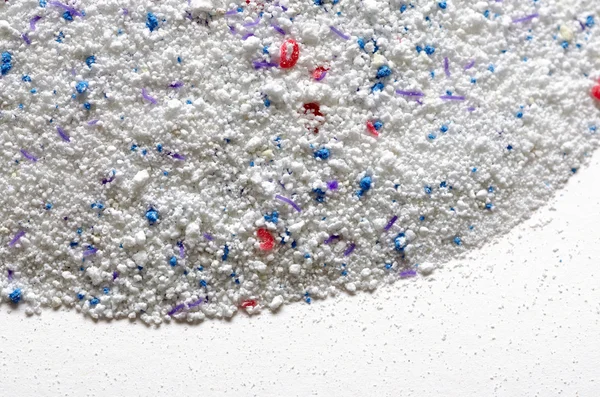 Washing powder texture with blue and red disseminations — Stock Photo, Image