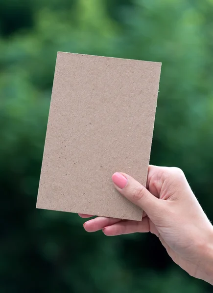 Greeting card in woman hand — Stock Photo, Image