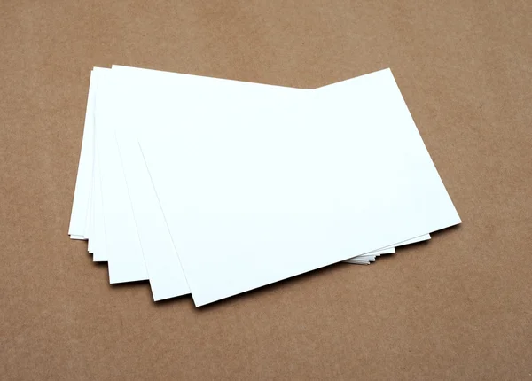 Stack of blank white business cards on crafts background — Stock Photo, Image