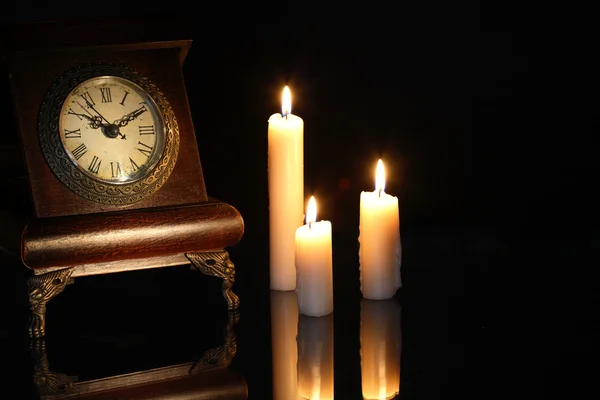 Orologio e candele — Foto Stock