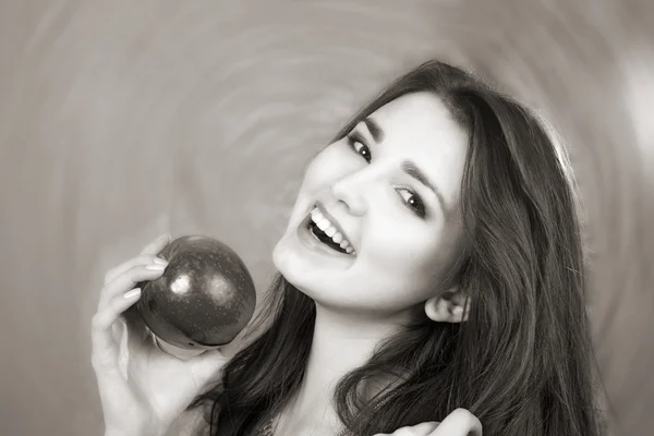 Girl with an apple — Stock Photo, Image