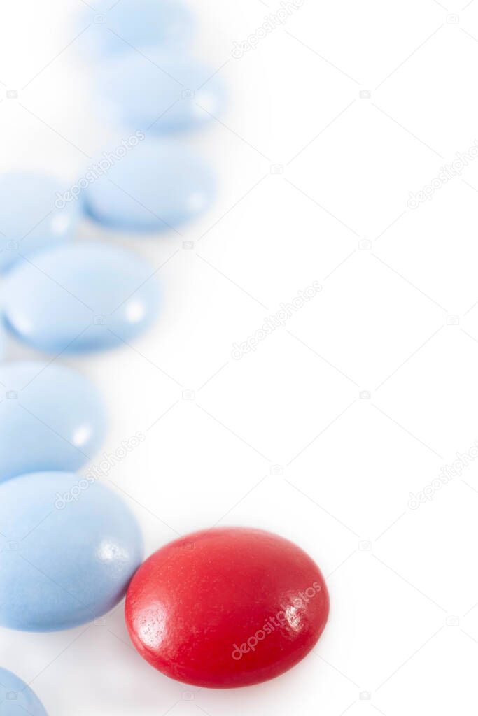 blue and red pills on white background