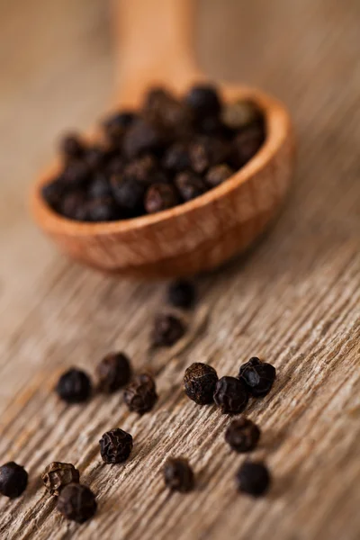 Black pepper in wooden Royalty Free Stock Images