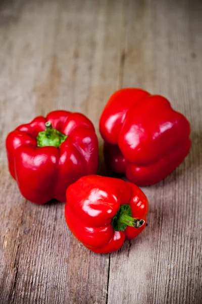 Three red bell peppers — Stock Photo, Image